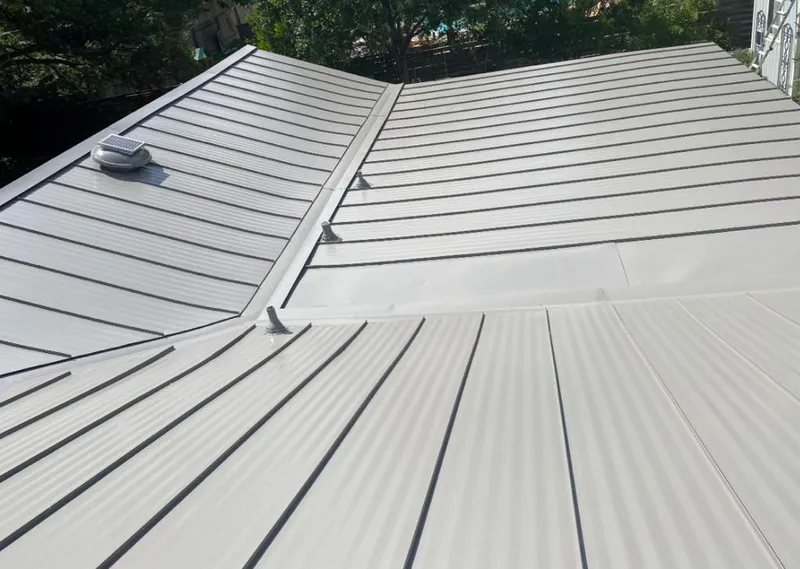Solar attic fan installed on a metal roof for Roof Ventilation in Sudden Valley